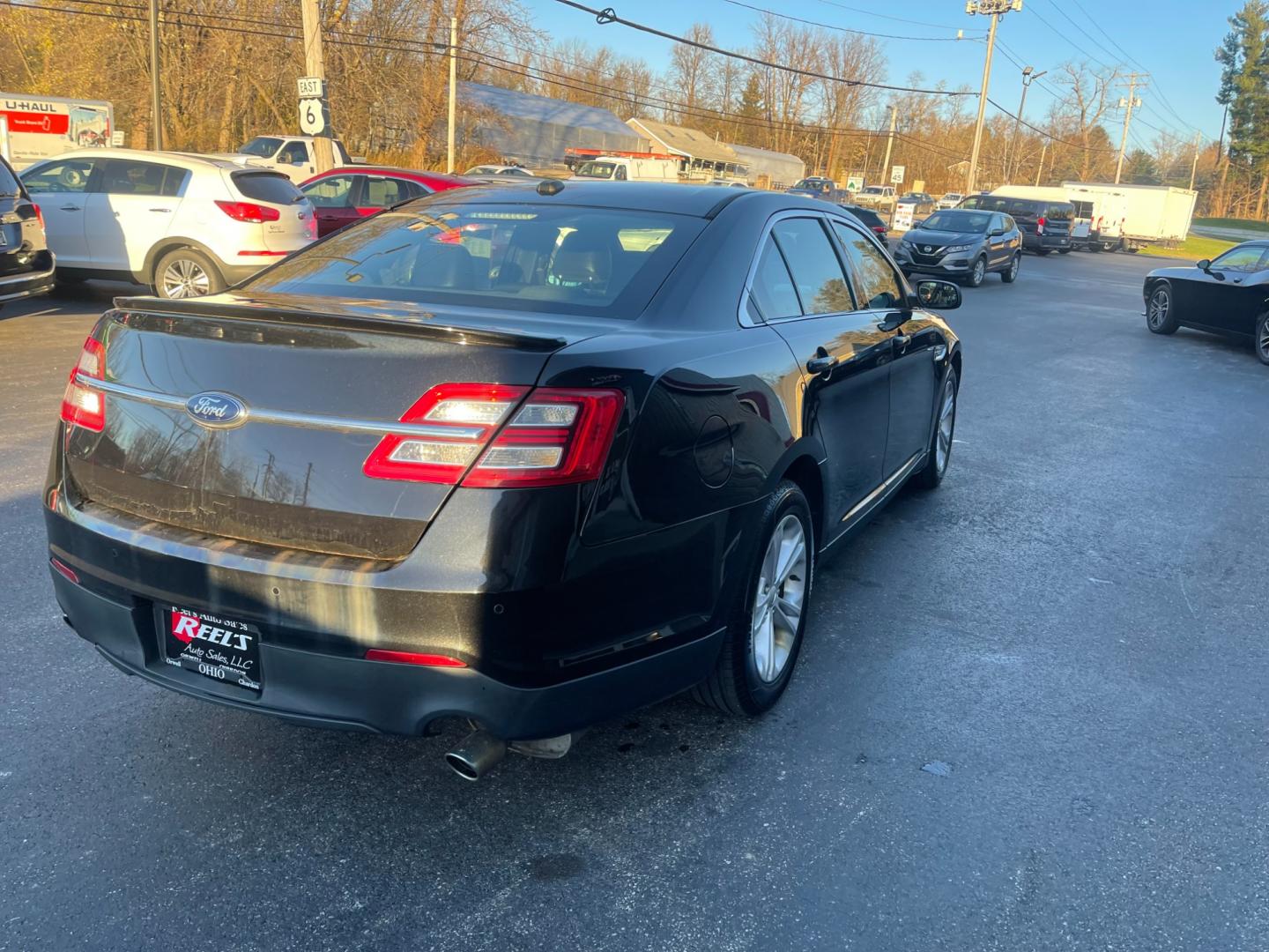 2013 Black /Black Ford Taurus SEL FWD (1FAHP2E85DG) with an 3.5L V6 DOHC 24V engine, 6-Speed Automatic transmission, located at 547 E. Main St., Orwell, OH, 44076, (440) 437-5893, 41.535435, -80.847855 - Photo#8